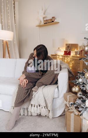 Woman Enjoying Cozy Moments with Stock Photo