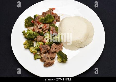 Beef Stew Served With African Ugali And Kienyeji Vegetables Beef Stew