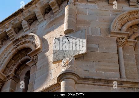 A Sundial on the side of a church in Spain Stock Photo