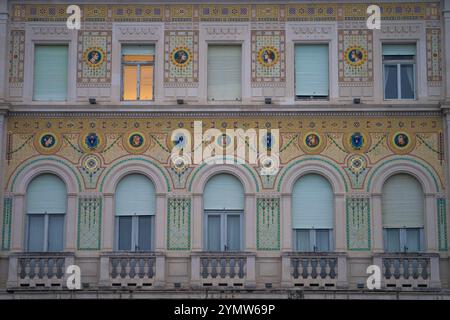 Mosaics on the facade of 'Palazzo del Governo' building in piazza Unità d'Italia, Trieste city center, Italy 03.01.2024 Stock Photo