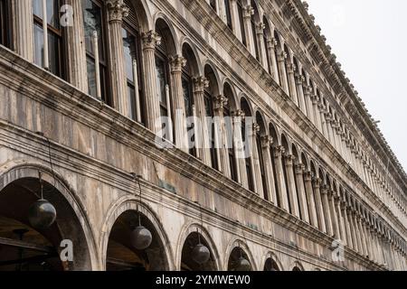 The long Arcade, known as the Procuratie Vecchie on the north side of St Mark's Square, piazzetta facade - Doges palace in Venice, Italy 04.01.2024 Stock Photo