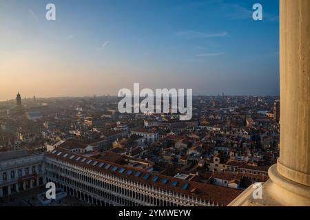 Aerial view at sunset from Campanile di san Marco of Piazza San Marco (St Mark's Square) past the Palazzo Ducale (Doge's Palace) in Venice, Italy Stock Photo