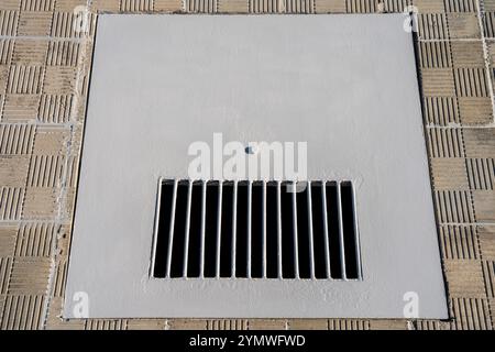 A metal pool water drain Stock Photo