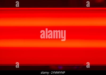 This image features a close-up view of an orange band with black edges, showcasing a minimalist and clean design perfect for various visual projects. Stock Photo