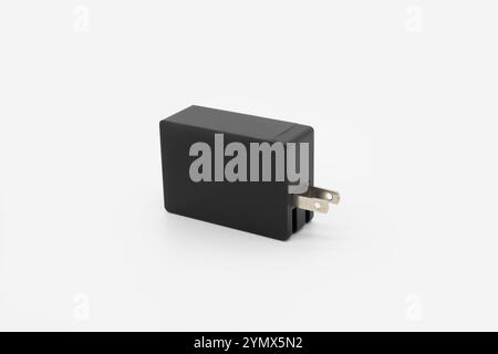 Modern USB charger designed for multiple devices like mobile phones, tablets, and laptops, perfect for technology, gadget, and connectivity-themed pro Stock Photo