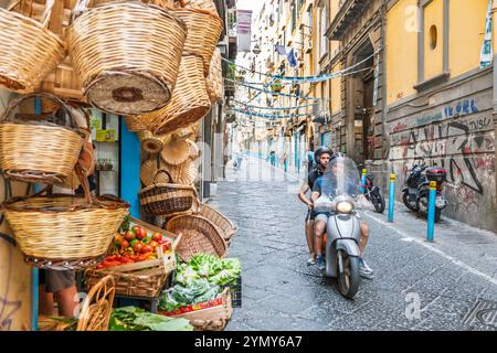 Naples Napoli Italy,Centro Storico historic center,Via Monteoliveto Street of Mount Oliveto,narrow side street,cobblestone alley,local shops,street ve Stock Photo