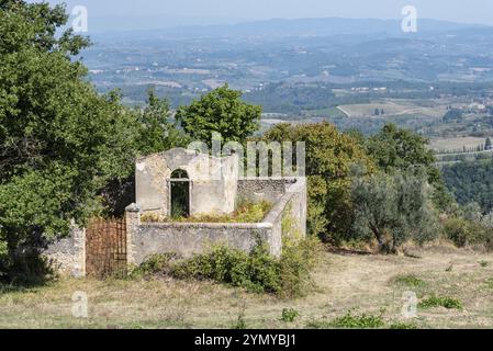 A small derelict cemetery near the Cellole monastery in the beautiful landscape of the Tuscany, Italy, Europe Stock Photo