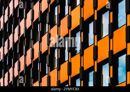 Modern Multicolored Architectural Facade with Repetitive Geometric Patterns Stock Photo