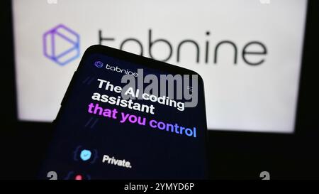 Stuttgart, Germany, 03-08-2024: Mobile phone with website of Israeli AI coding company Tabnine Ltd. in front of business logo. Focus on top-left of ph Stock Photo