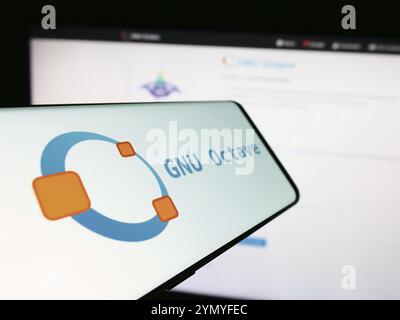 Stuttgart, Germany, 03-13-2024: Cellphone with logo of scientific programming language GNU Octave in front of website. Focus on center-left of phone d Stock Photo