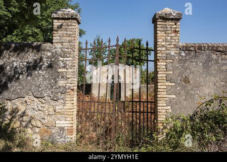 A small derelict cemetery near the Cellole monastery in the beautiful landscape of the Tuscany, Italy, Europe Stock Photo