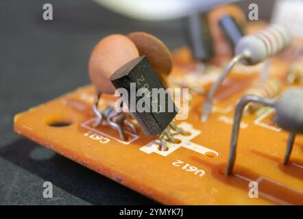 High voltage transistor on the electronic circuit board. TO-92L plastic-encapsulate transistors. Stock Photo