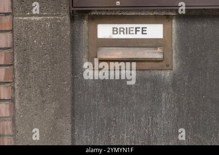 Letterbox on an old house wall in germany Stock Photo
