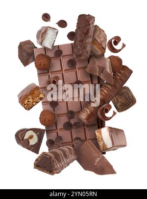 Different chocolate products in air on white background Stock Photo