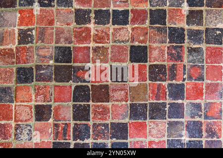 Red and brown terracotta tile texture, very old, typical of France Stock Photo