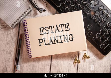 Tax form with business card with text Estate Planing. Notepad, eyeglasses and white pen. Financial concept Stock Photo