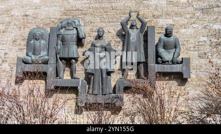 Edmonton,Canada, April 28, 2024: Artwork of working people representing Alberta on the wall of the forner Royal Alberta Museum Stock Photo