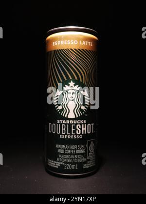 Coffee cold drink espresso starbucks Doubleshot in a metal jar isolated on a black background. Low claw. Coffee drink Stock Photo