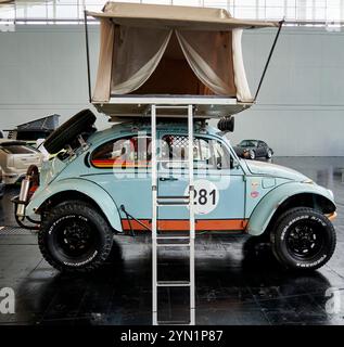 VW Beetle historic car with car tent on the roof in Hannover, Germany, July 7, 2024 Stock Photo