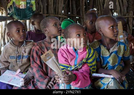 School children eagerly watching the teacher in a lesson at a massai school in the Serengeti National Park Tanzania Stock Photo