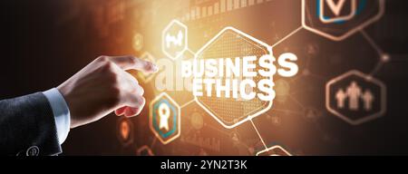 Business man writing business ethic concept on virtual screen. Stock Photo