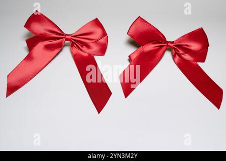 two red ribbons on a isolated white background Stock Photo
