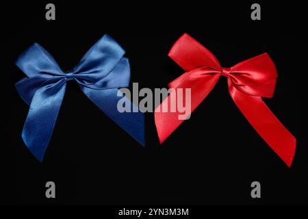 blue and red ribbon  on black  background Stock Photo