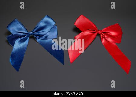 blue and red ribbon  on dark grey  background Stock Photo