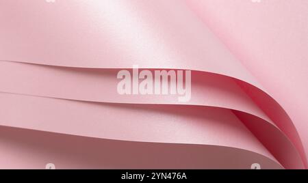 Pink paper background with a soft pastel gradient and glossy texture. Featuring a polished surface with subtle shimmer and a luminous glow, it exudes Stock Photo