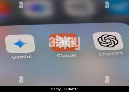 Claude, Gemini and ChatGPT AI app icon on screen Stock Photo