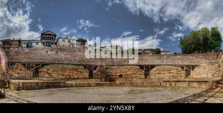 Panoramic view of Antique ancient theater in Ohrid. It was built more than two millennia, sometime at the end  of 3rd or the beginning of 2nd century. Stock Photo