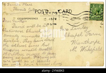 Reverse of original WW1 era postcard posted in September from Leeds in 1914 near the start of WW1. Mention of fever. Stock Photo