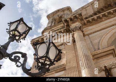 Scenic portal of Basilica of Saints Cosmas and Damian in Alberobello, Southern Italy Stock Photo