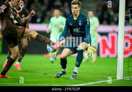 left to right Jackson IRVINE (St. Pauli), goalwart Moritz NICOLAS (MG) goalchance, parade, action, duels, soccer 1st Bundesliga, 11th matchday, Borussia Monchengladbach (MG) - FC St. Pauli Hamburg Hamburg 2:0, on November 24th, 2024 in Borussia Monchengladbach/ Germany. #DFL regulations prohibit any use of photographs as image sequences and/or quasi-video # Stock Photo