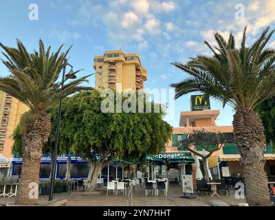 The Torres Del Sol Apartments and nearby restaurants, including McDonalds. Los Cristianos, Arona, Tenerife, Canary Islands, Spain. 5th February 2023. Stock Photo