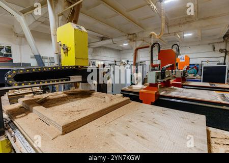 Woodworking workshop. Automated CNC drilling and milling machines. Stock Photo