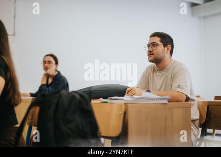 High school students attentively participating in a classroom session Stock Photo