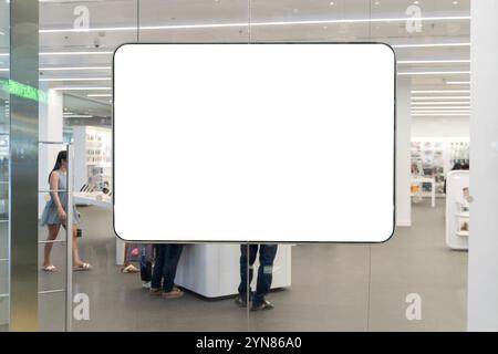 Big Blank billboard with copy space for your text message or content in shopping mall. Mock up. Blank vertical poster billboard, advertising stand, li Stock Photo