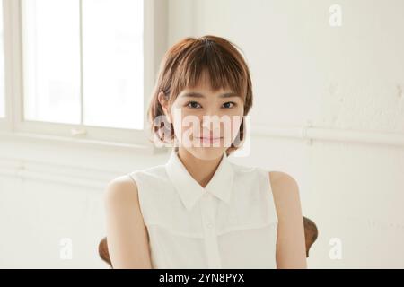 Woman in her 20s with a nice smile Stock Photo