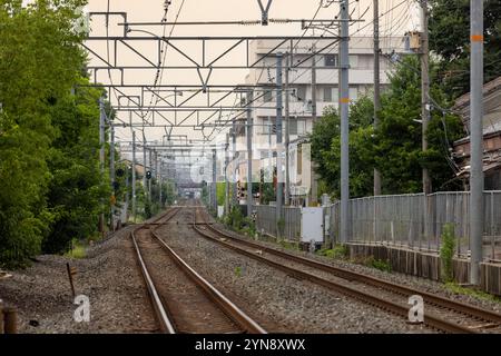 Quiet Train Tracks in a Suburban Japanese Neighborhood Stock Photo