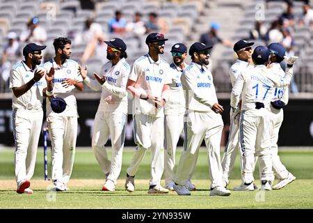 Perth, Australia. 25th Nov, 2024. Indian team players celebrates after the dismissal of Mitchell Starc of Australia during day four of the First Test match in the series between Australia and India at Perth Stadium on November 25, 2024 in Perth, Australia. (Photo by Izhar Khan) IMAGE RESTRICTED TO EDITORIAL USE - STRICTLY NO COMMERCIAL USE Credit: Izhar Ahmed Khan/Alamy Live News/Alamy Live News Stock Photo