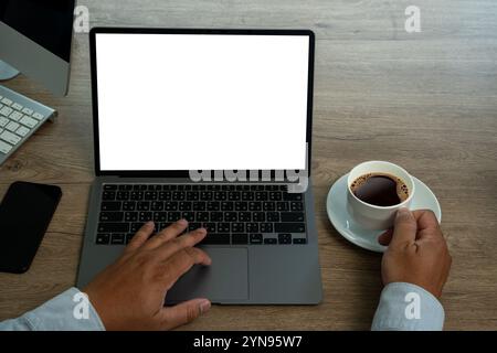 Side view man man working using a desktop computer of the blank screen Stock Photo