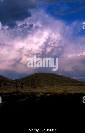 A storm cloud mounts above Steamboat Lake State Park, Colorado. Stock Photo