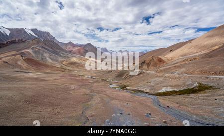 Colorful landscape view at high altitude Ak Baital pass aka Hushang, highest point on Pamir Highway M41, Murghab, Gorno-Badakhshan, Tajikistan Stock Photo