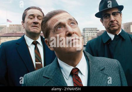 THE IRISHMAN 2019 Netflix gangster film with from left: Robert De Niro as Frank Sheeran,  Al Pacino as Jimmy Hoffa,Ray Romano as Bill Bufalino Stock Photo