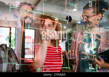 Software engineers working together on project at tech startup. Business designers working together Stock Photo