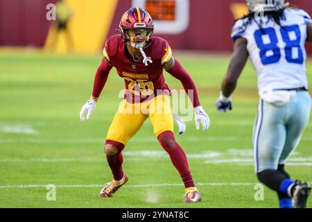 Washington Commanders cornerback Benjamin St-Juste (25) tackles Dallas ...