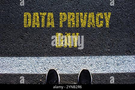 Data privacy day message written on asphalt road. Conceptual data privacy day symbol. Copy space. Stock Photo