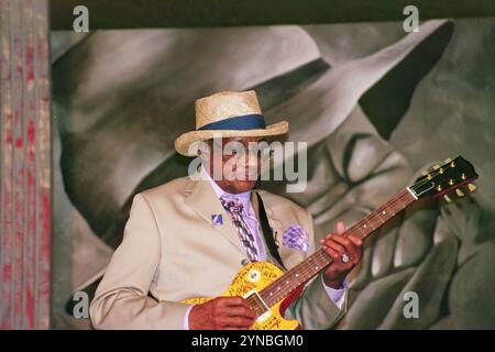 New Orleans, LA, USA - April 28, 2005: Hubert Sumlin plays his multiple-autographed Gibson Les Paul Guitar at the 2005 New Orleans Jazz and Heritage Festival for the Howlin' Wolf tribute Stock Photo