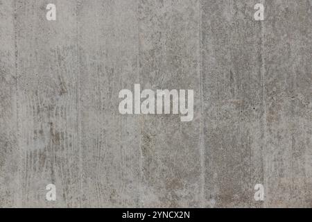 Dark concrete background surface, Texture of wooden formwork stamped on raw concrete wall as background Stock Photo